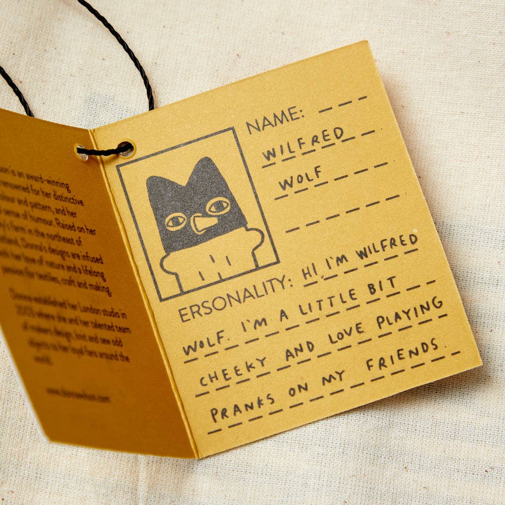 Card with a wolf illustration and text on a beige background