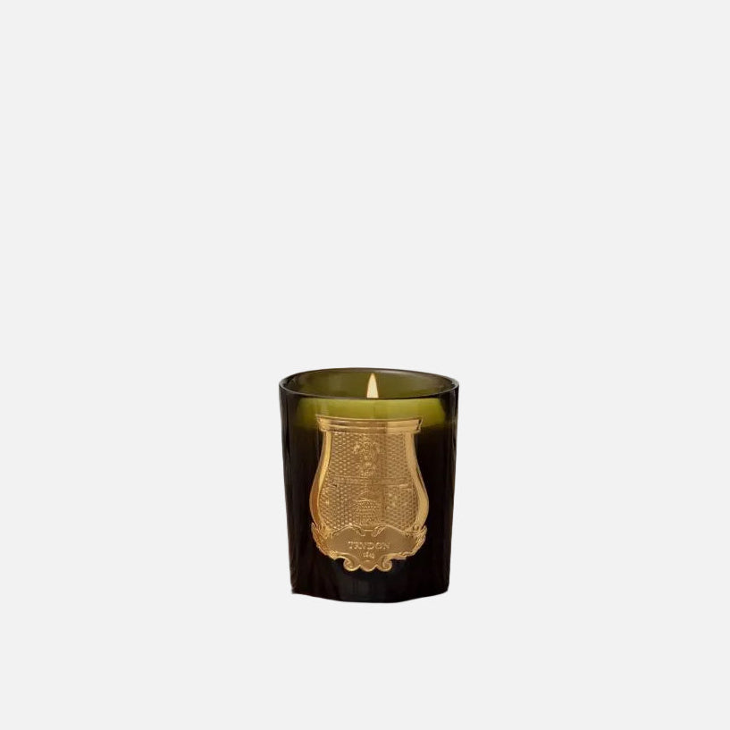 Green candle with gold label