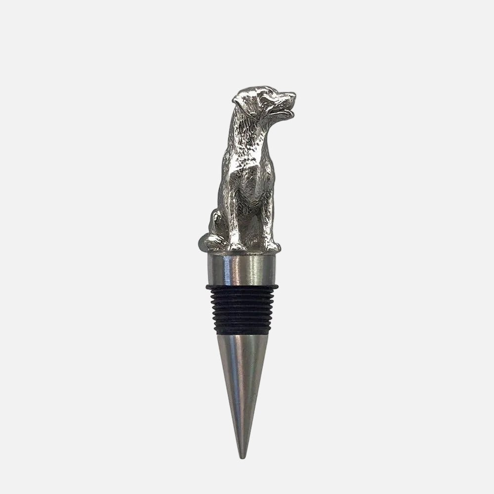 Dog-shaped bottle stopper on a white background