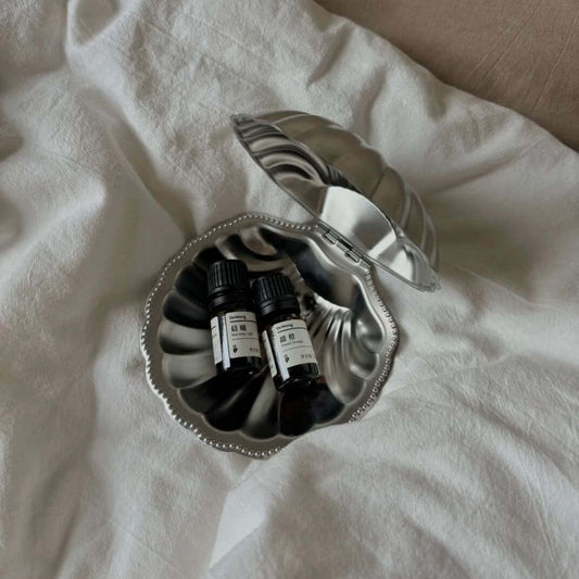 Vintage Metal Shell Box, open, holding small perfume bottles