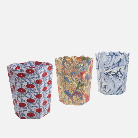 Three patterned paper bins on a white background