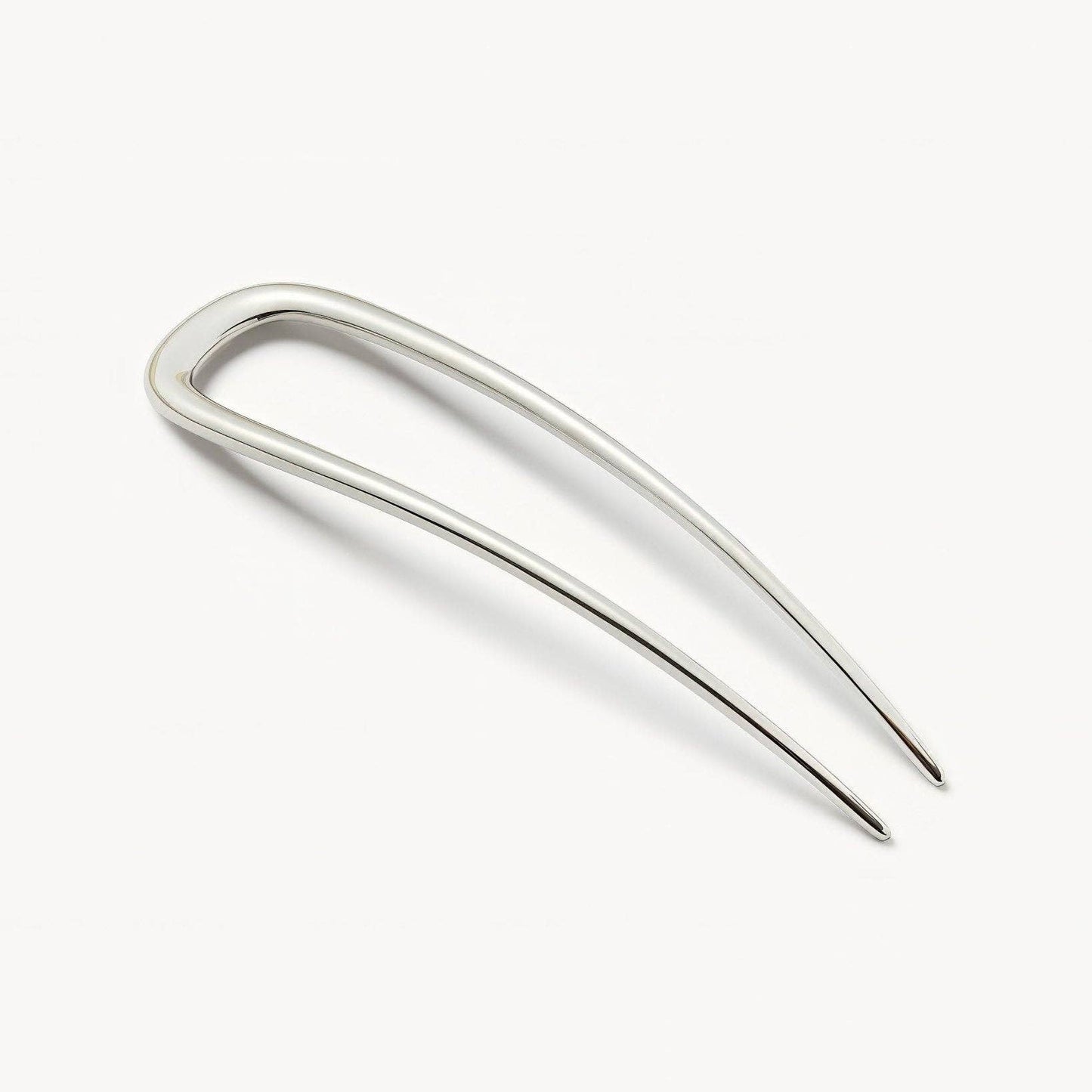 Silver hair clip on a white background