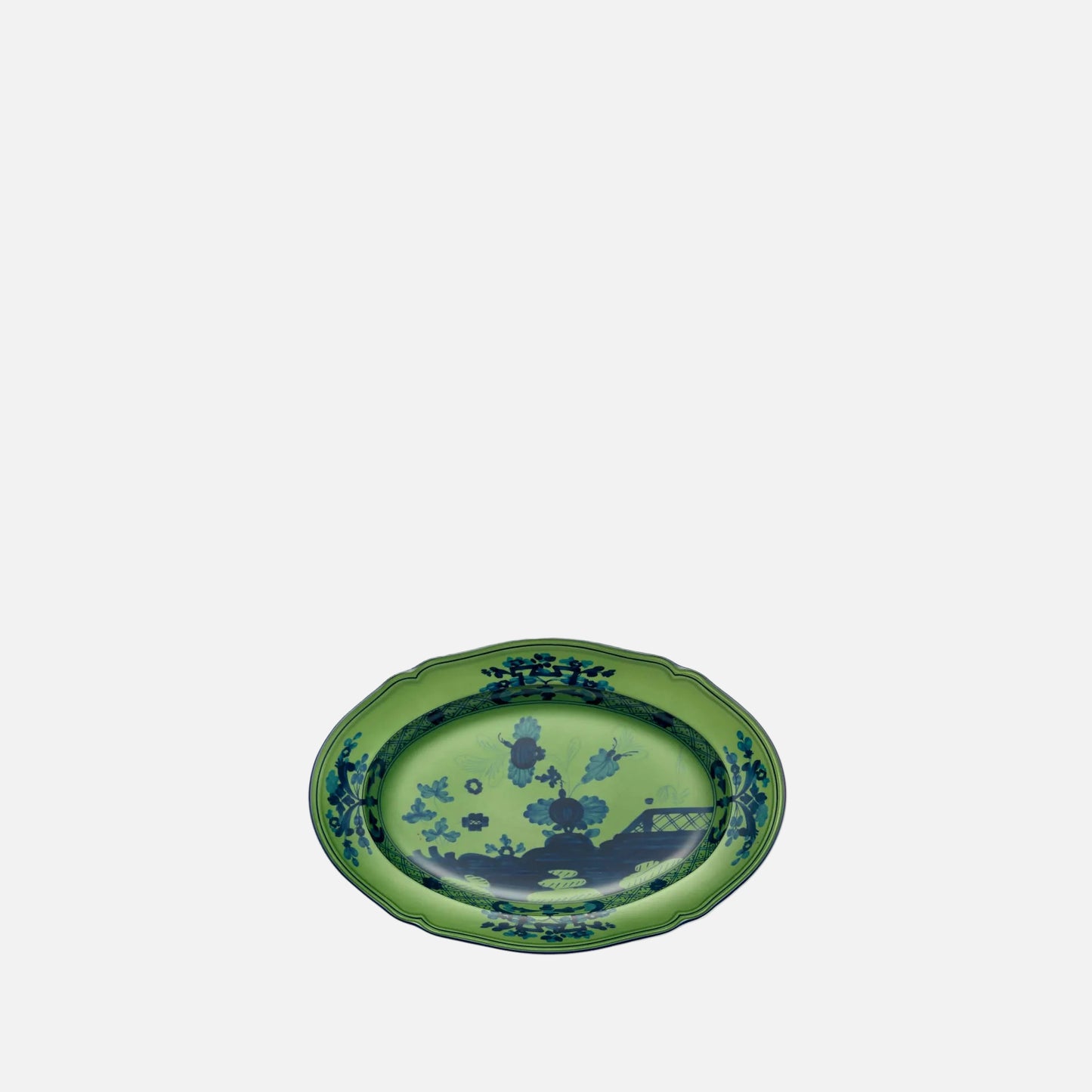 An oval green ceramic serving platter with a blue landscape illustration and decorative border, shown on a plain white background.