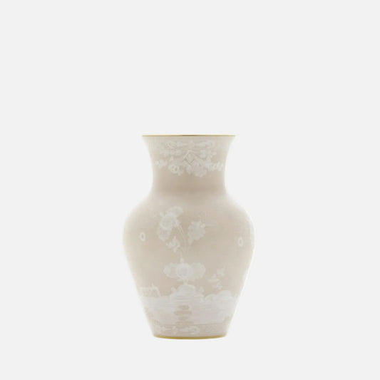 A classic ceramic vase with a flared neck and bulbous body, featuring a delicate white floral and landscape pattern on a warm cream-colored glaze, set against a solid white background.