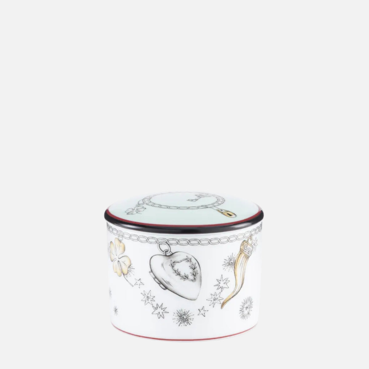 A small cylindrical white ceramic container with a lid, decorated with jewelry-themed illustrations including a heart-shaped locket, a bow and arrow, and silver-toned chain motifs, with thin red and dark blue trim lines.