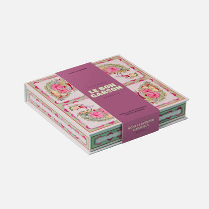 Card set packaging with floral design on a teal background