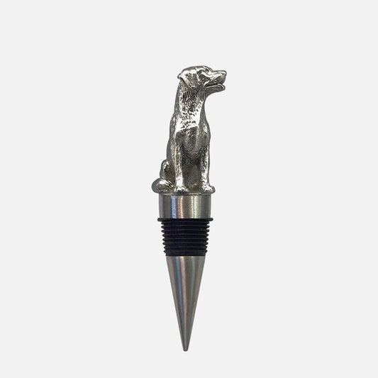 Dog-shaped bottle stopper on a white background