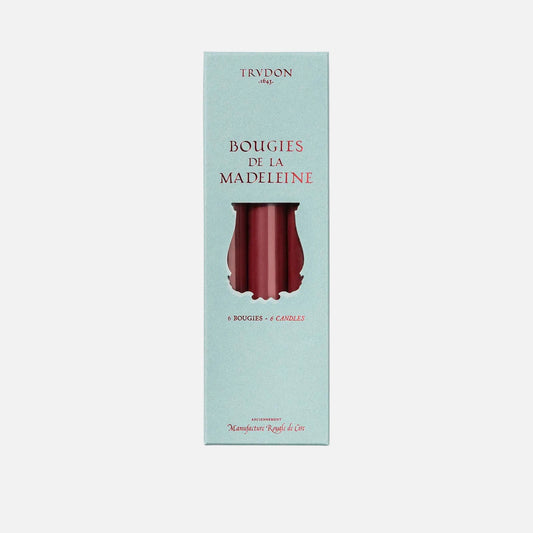 Box of terracotta candles on a light gray background