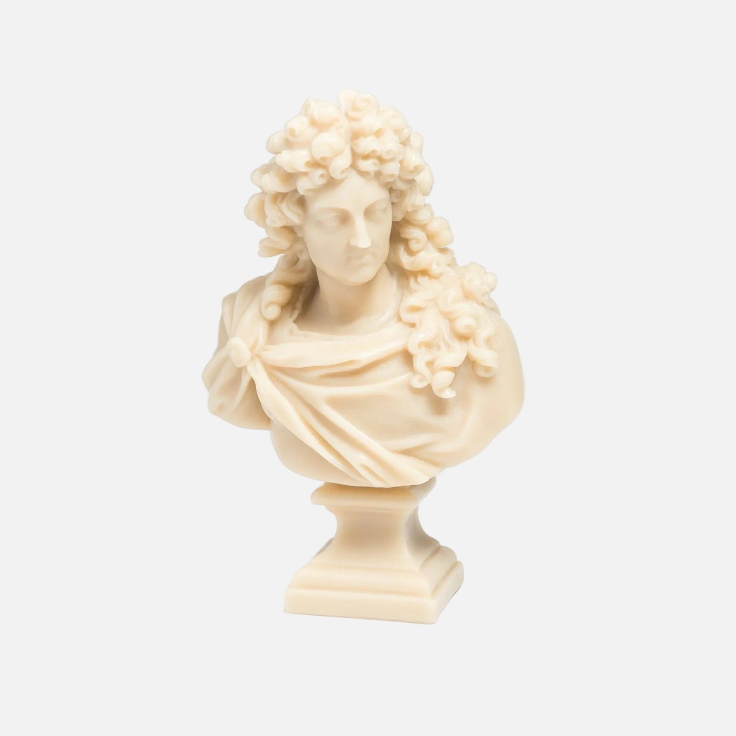 Bust sculpture of a classical figure on a light gray background
