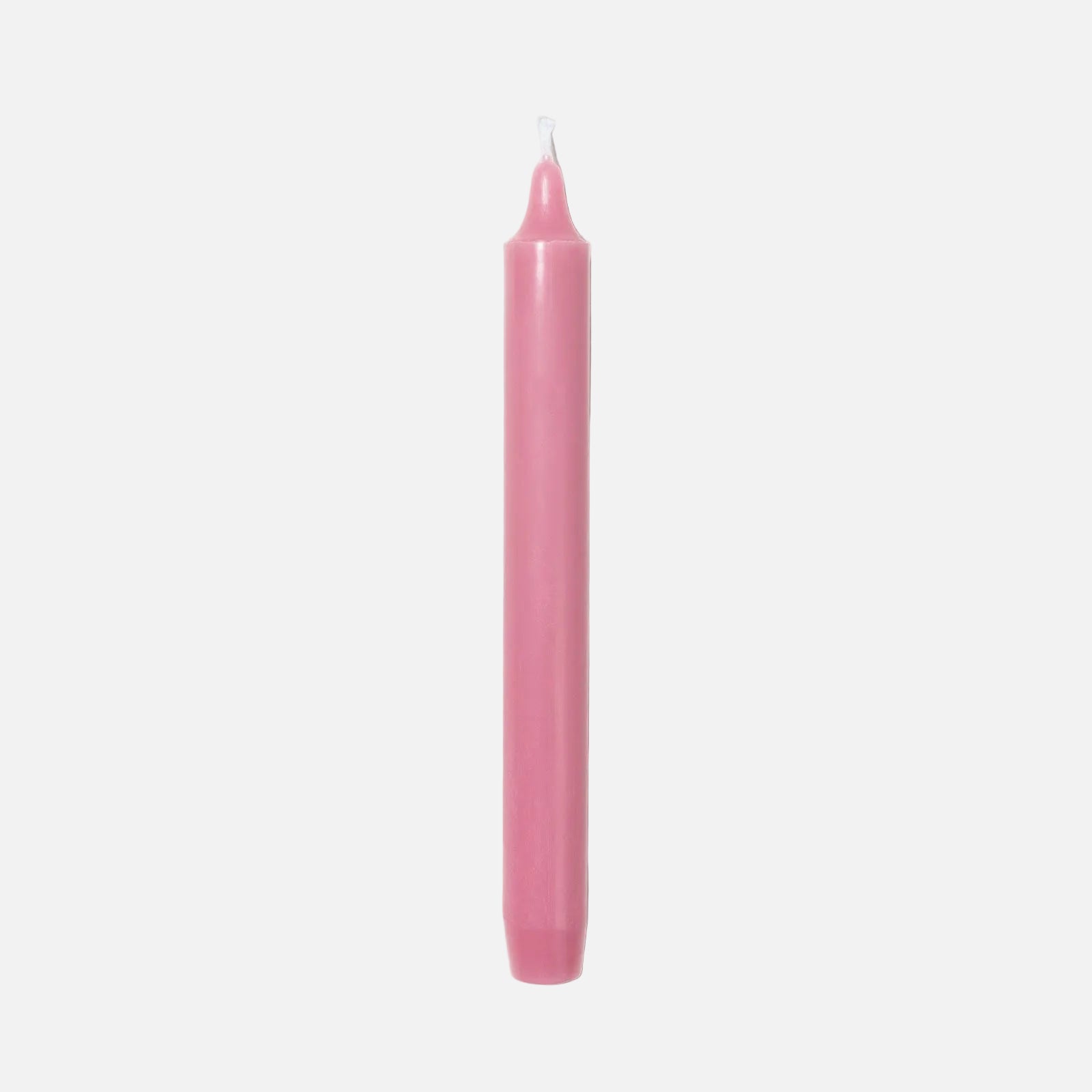 Blush candle on a light gray background