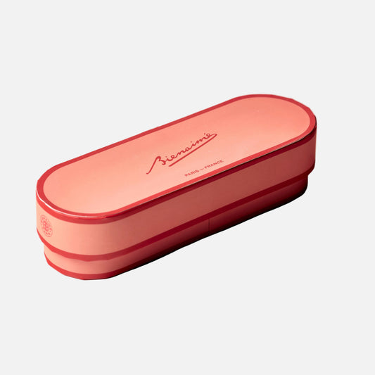 Pink oval container with a brand logo on a white background