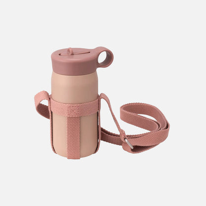 Pink water bottle with a matching strap on a white background