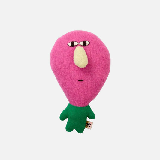 Pink plush toy with a green base on a white background