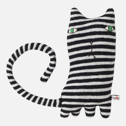 Black and white striped cat-shaped toy with green eyes on a white background