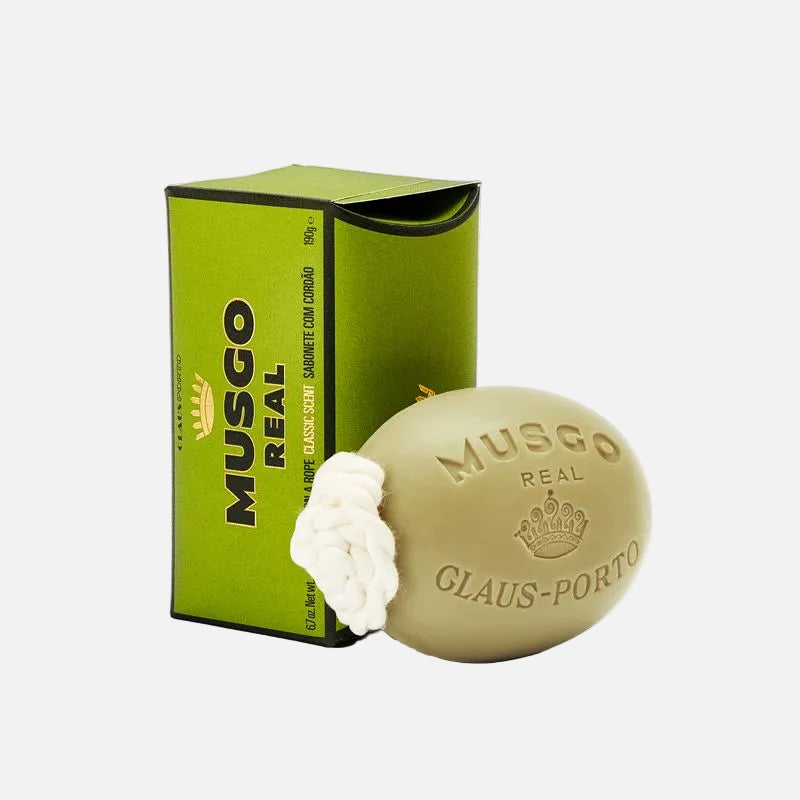 Musgo Real soap bar with green packaging on a white background