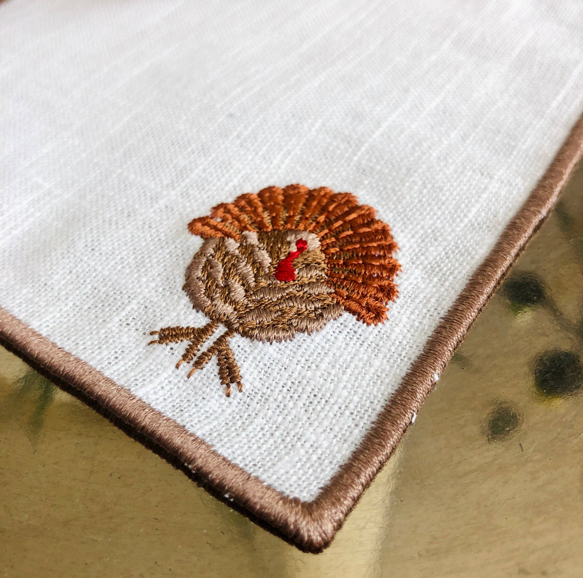 Set of 4 Thanksgiving Embroidered Turkey Cocktail Napkins: Light brown hem