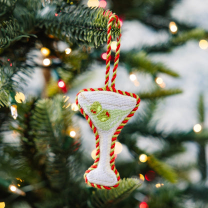 Decorative Christmas ornament shaped like a martini glass on a Christmas tree.