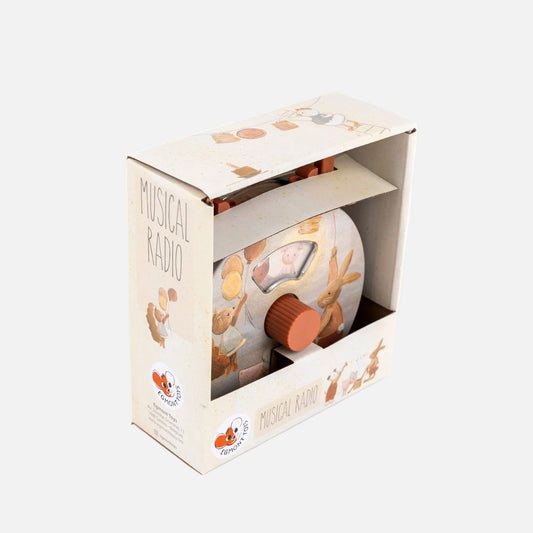 Musical radio in packaging with animal illustrations on a white background