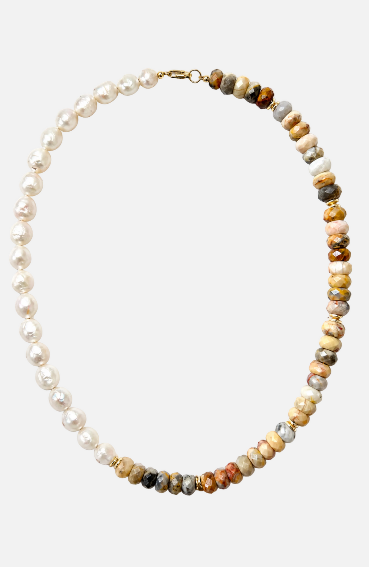Necklace with pearls and multicolored beads on a white background