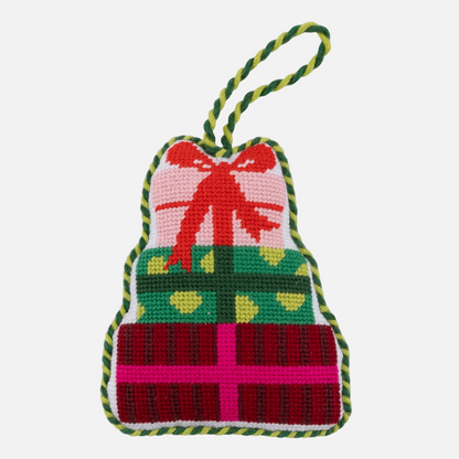 Colorful knitted gift bag with a bow on a white background