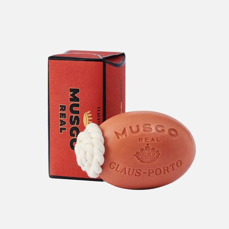 Bar of Musgo Real soap with packaging on a white background