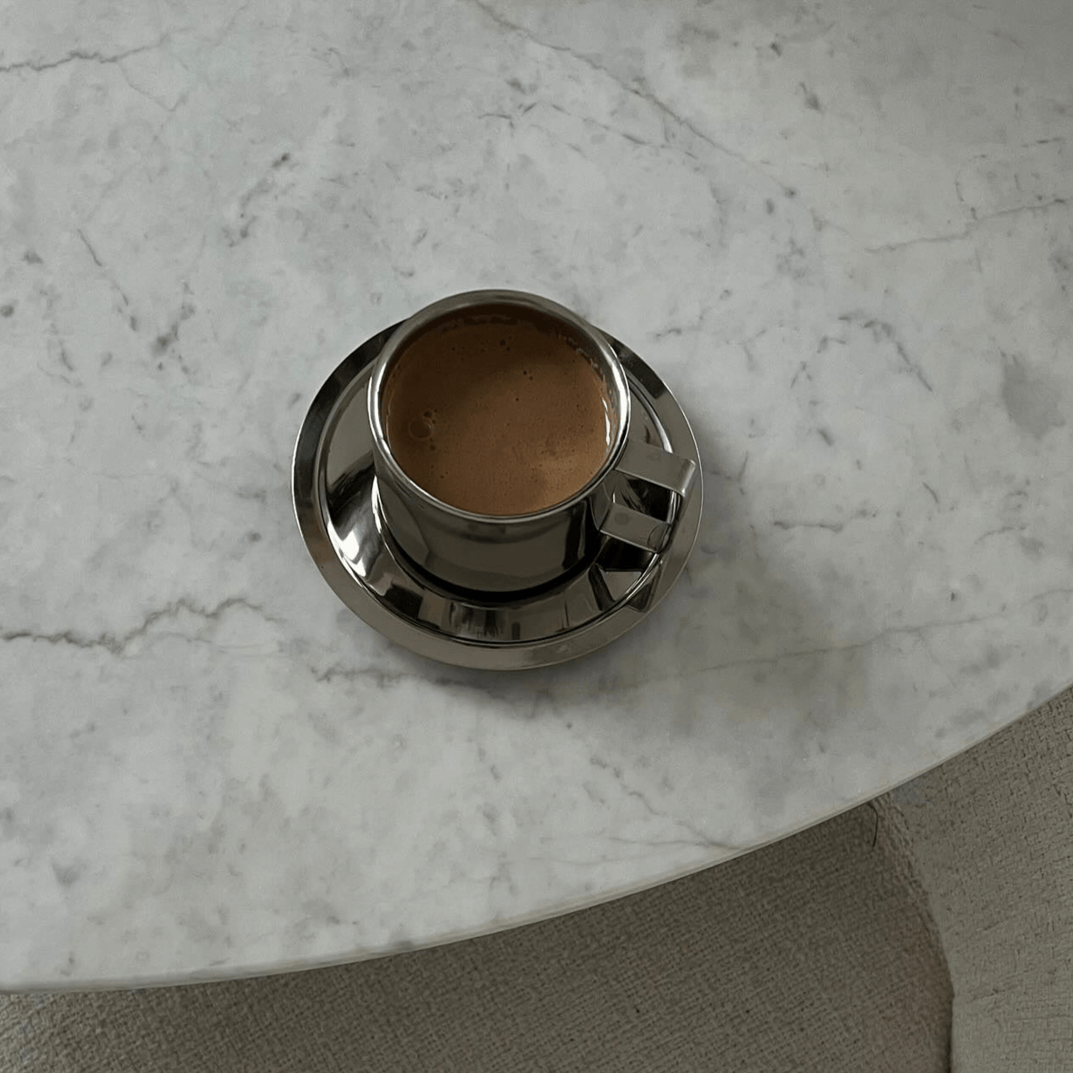 Italian Style Steel Latte Cup with saucer on marble