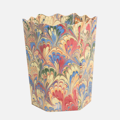 Colorful marbled patterned trash can on a white background
