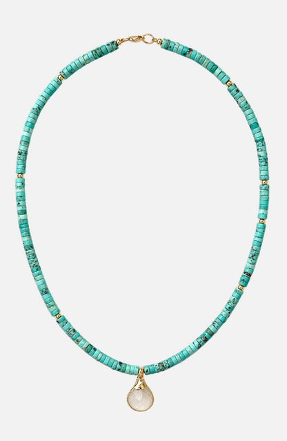 Turquoise beaded necklace with a gold clasp on a white background