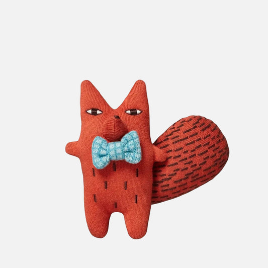 Red fox plush toy with a blue bow tie on a white background