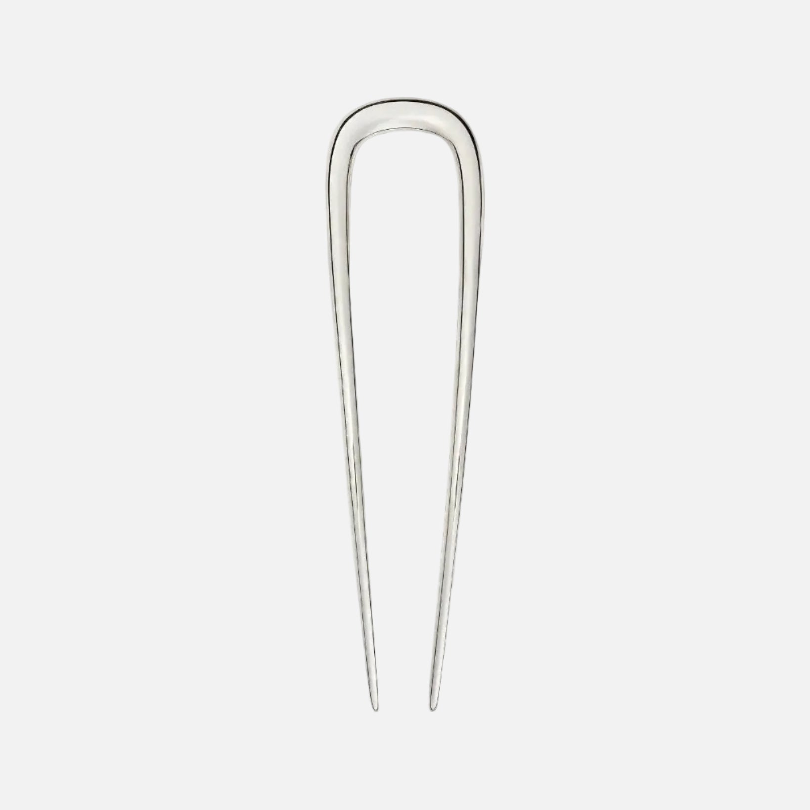 Silver hairpin on a white background