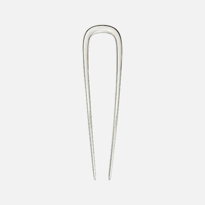 Silver hairpin on a white background