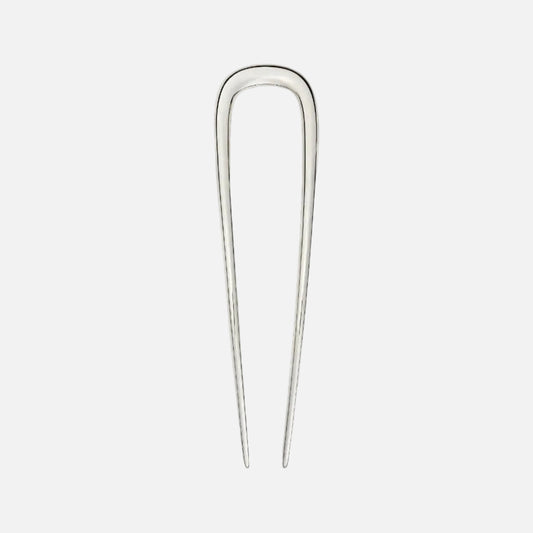 Silver hairpin on a white background