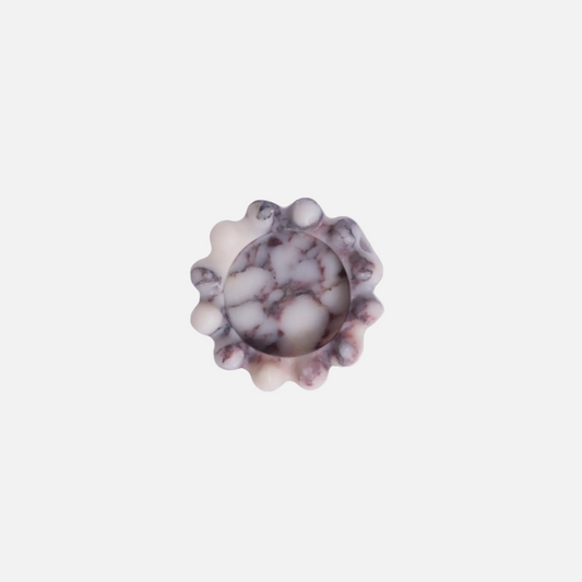 Marble-patterned pendant on a white background