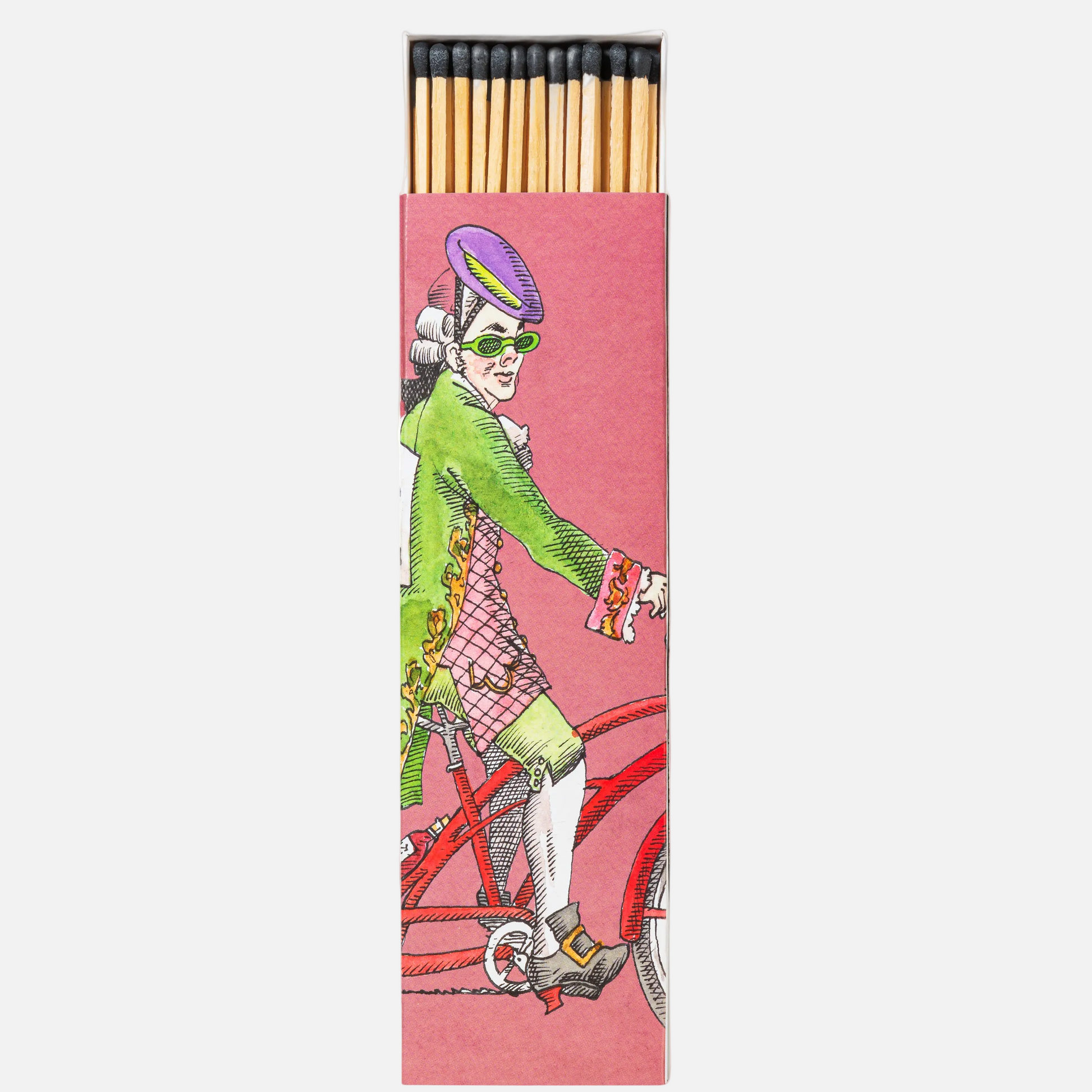 scented matches in a pink box with figure on a bike that is slightly open