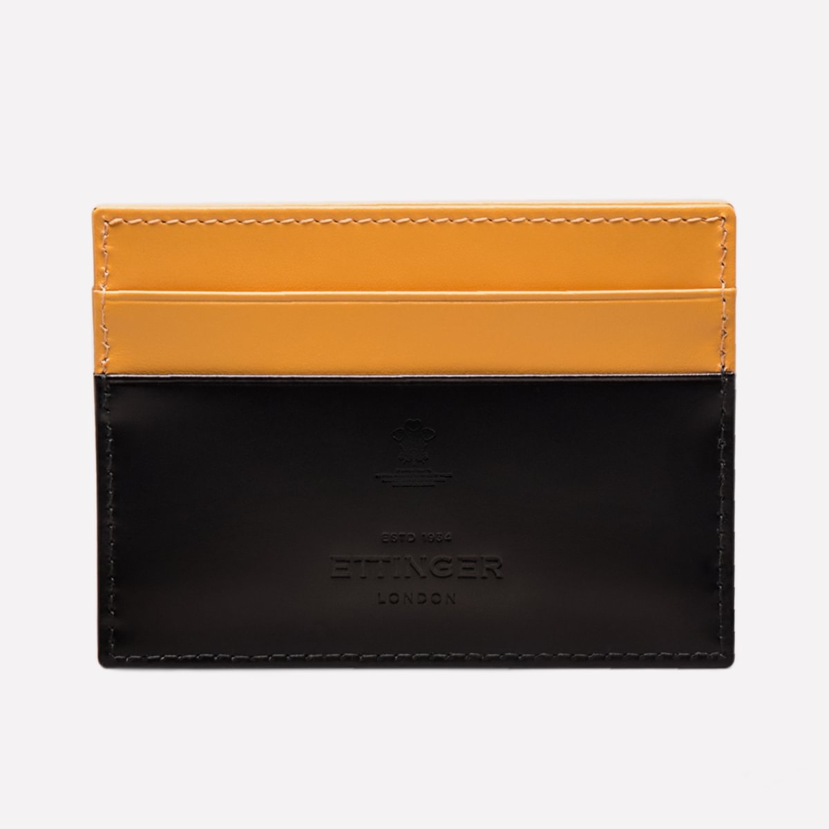 Black and orange leather cardholder with 'Buxton' branding on a white background