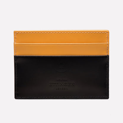 Black and orange leather cardholder with 'Buxton' branding on a white background