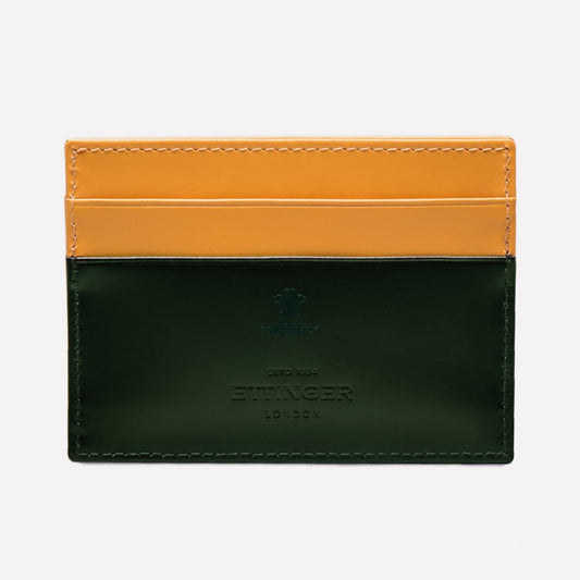Two-tone green and yellow leather cardholder with 'Spencer London' branding on a white background
