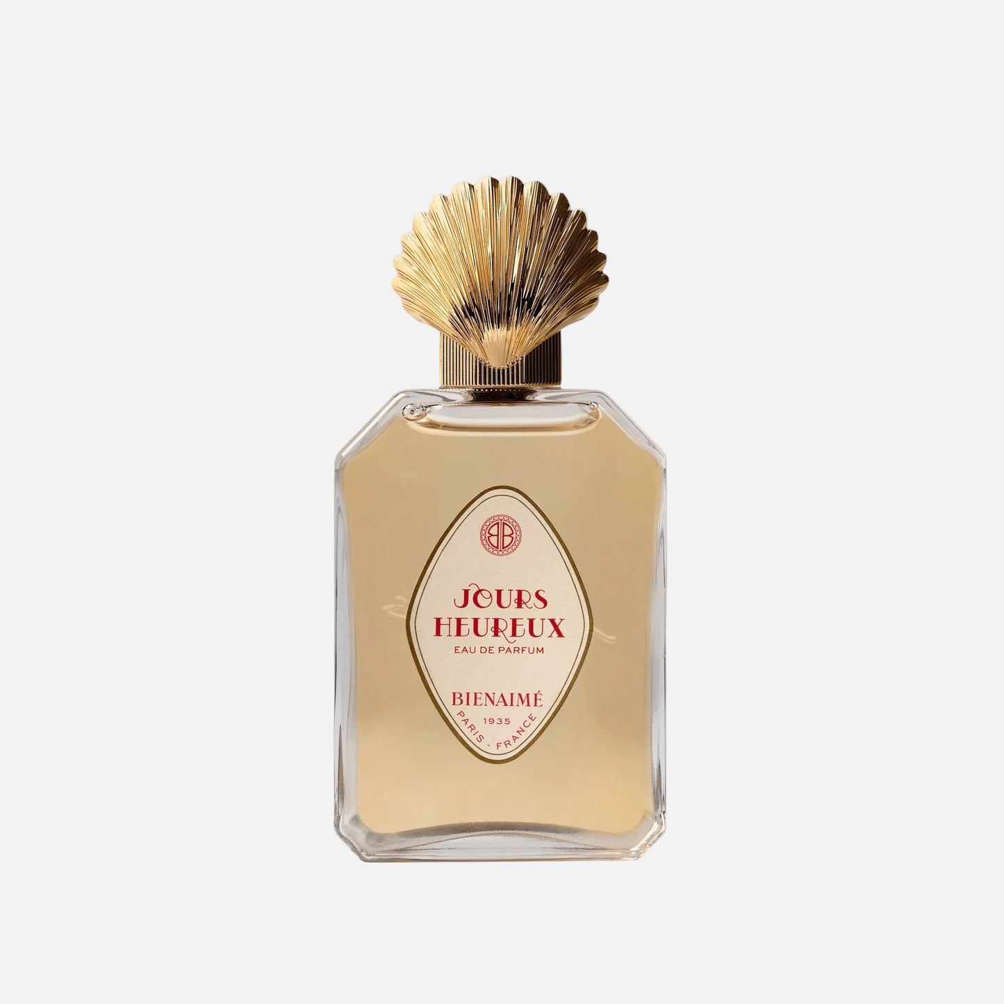 Perfume bottle with gold cap on a light background