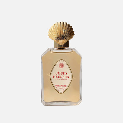 Perfume bottle with gold cap on a light background