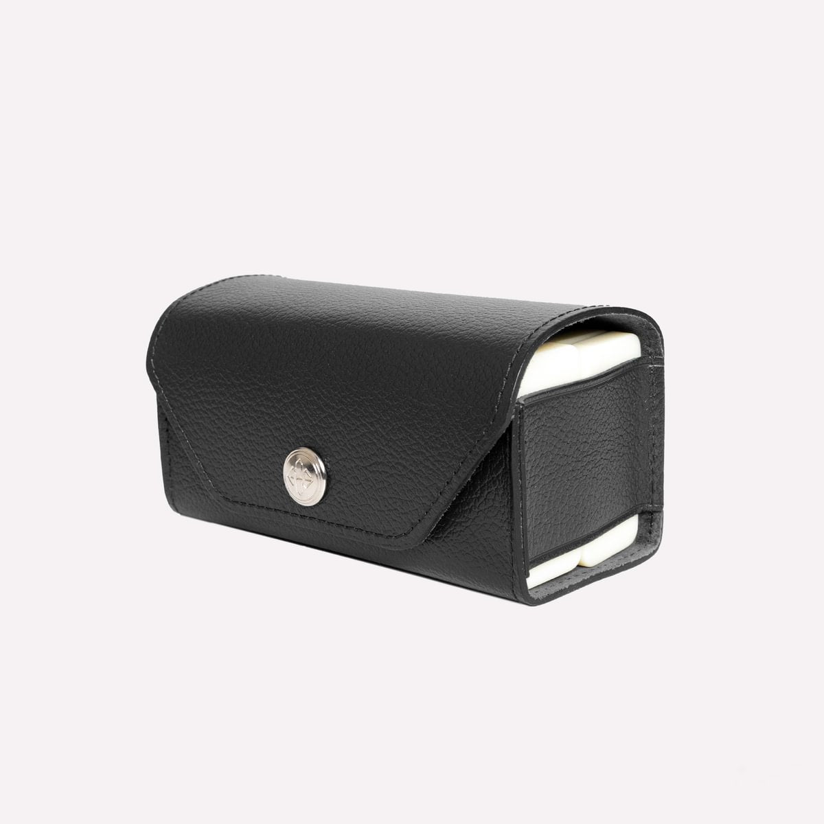 Black leather pouch with a silver clasp on a light gray background