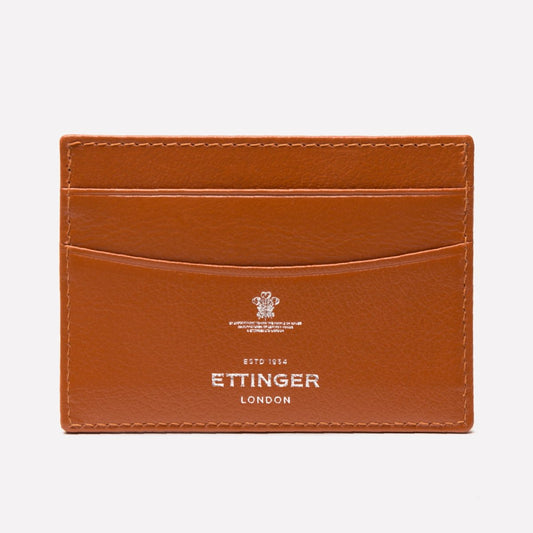 Brown leather cardholder with Ettinger London branding on a white background