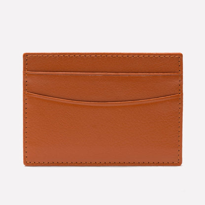 Brown leather cardholder on a white background