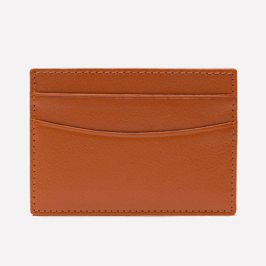 Brown leather cardholder on a white background