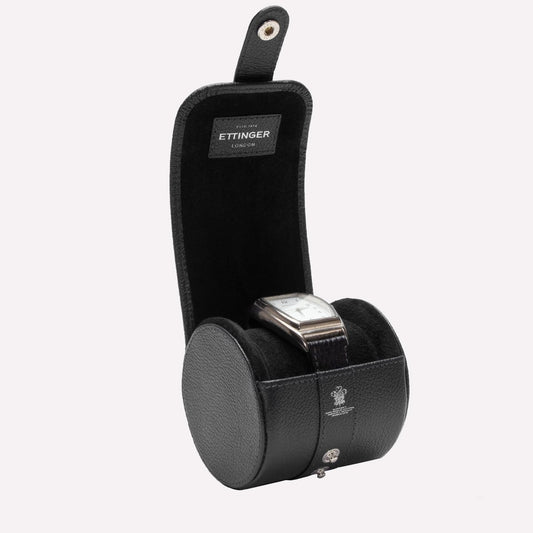 Black watch case with a watch inside on a white background, featuring the Ettinger brand.