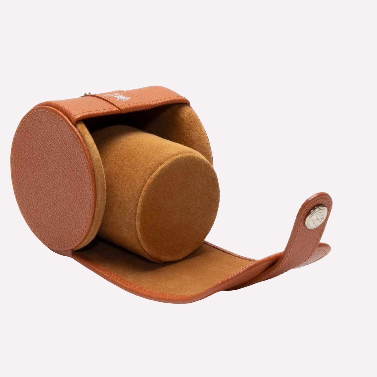 Brown leather watch case on a white background