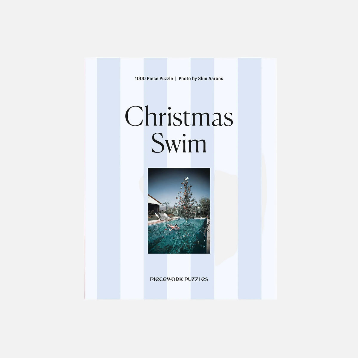 Puzzle box titled 'Christmas Swim' with a photo of a pool on the cover.