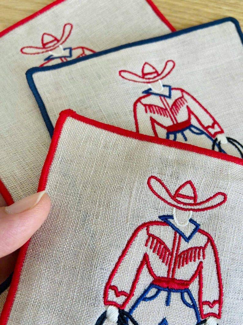 Cowboy Embroidered Linen Cocktail Napkins – Set of 4: Red hem