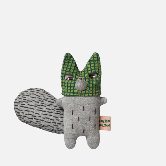 Plush toy fox with green checkered hood on a white background