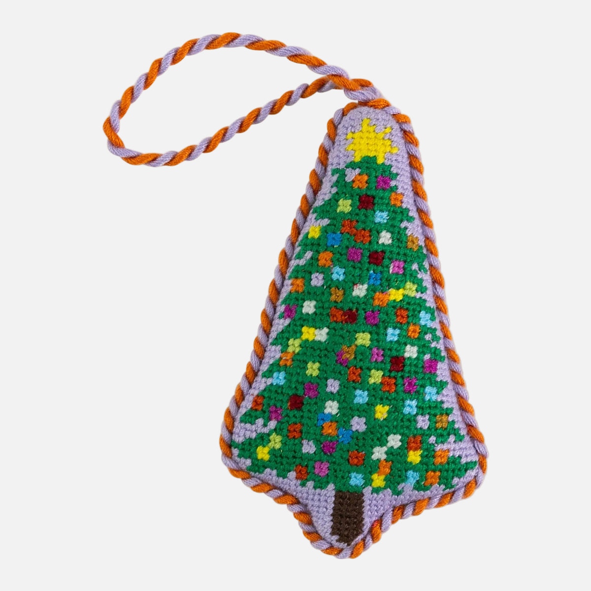 Colorful crocheted Christmas tree ornament with a star on a white background