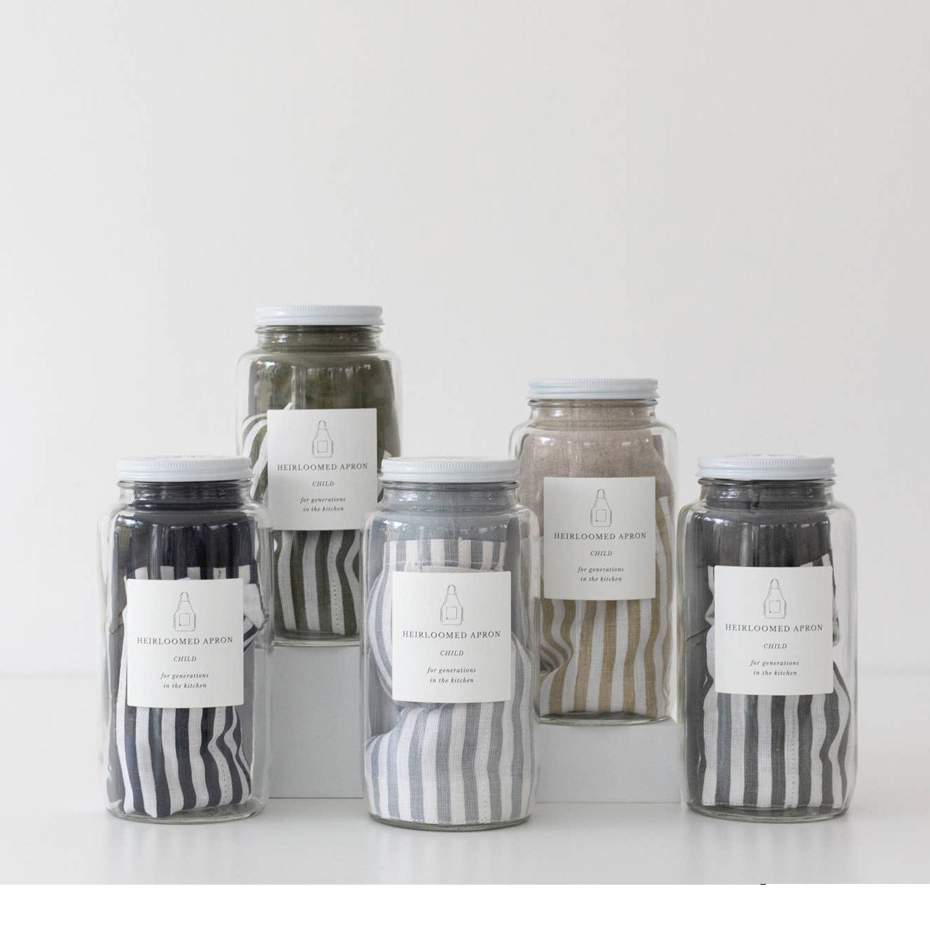 Set of jars with striped labels on a white background